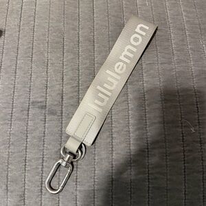 lululemon gray never lost keychain